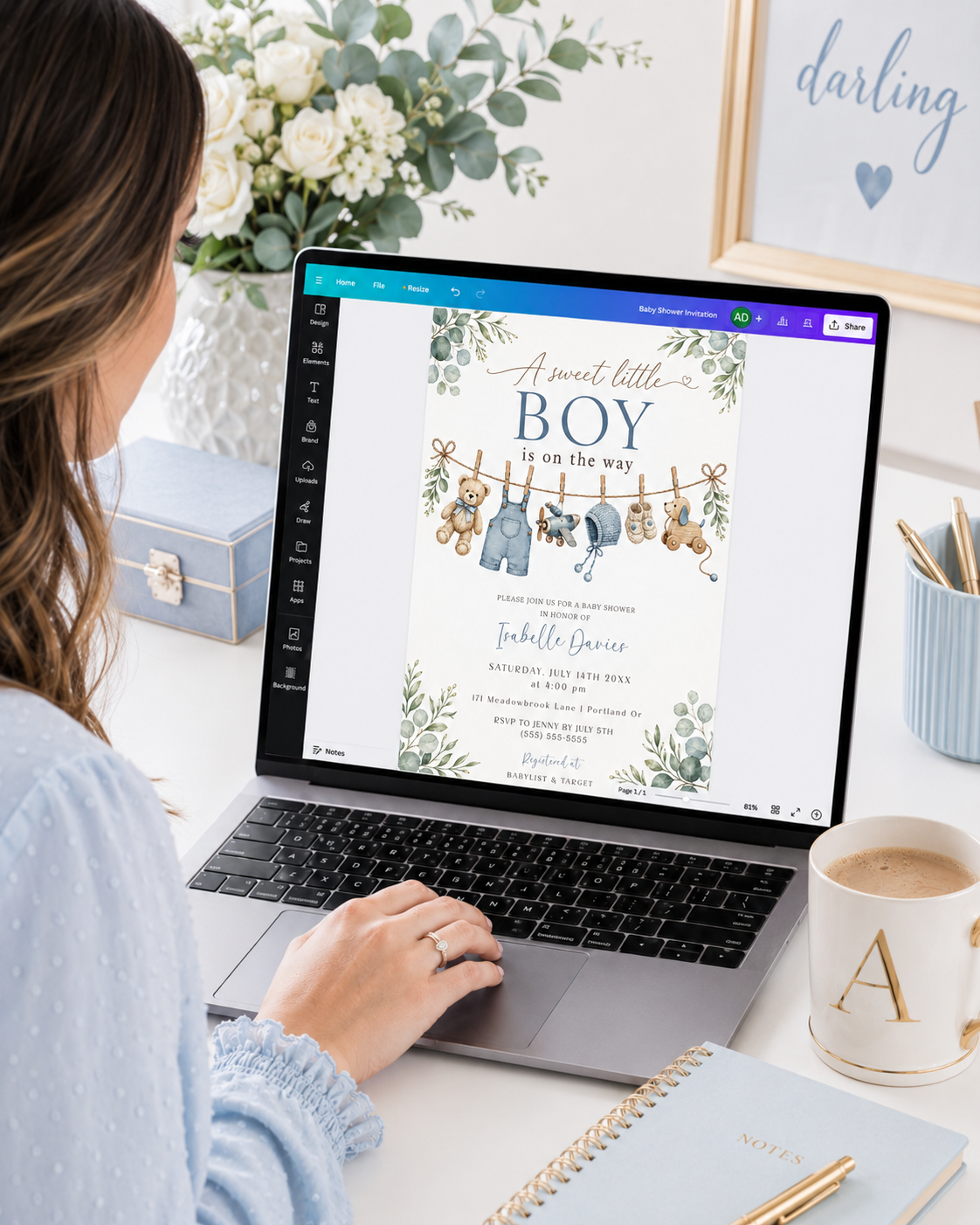 Editable boy baby shower invitation Canva template with watercolour clothesline scene featuring denim overalls, knit bonnet, booties, toy airplane, wooden pull dog, and teddy bear with eucalyptus border on a white background
