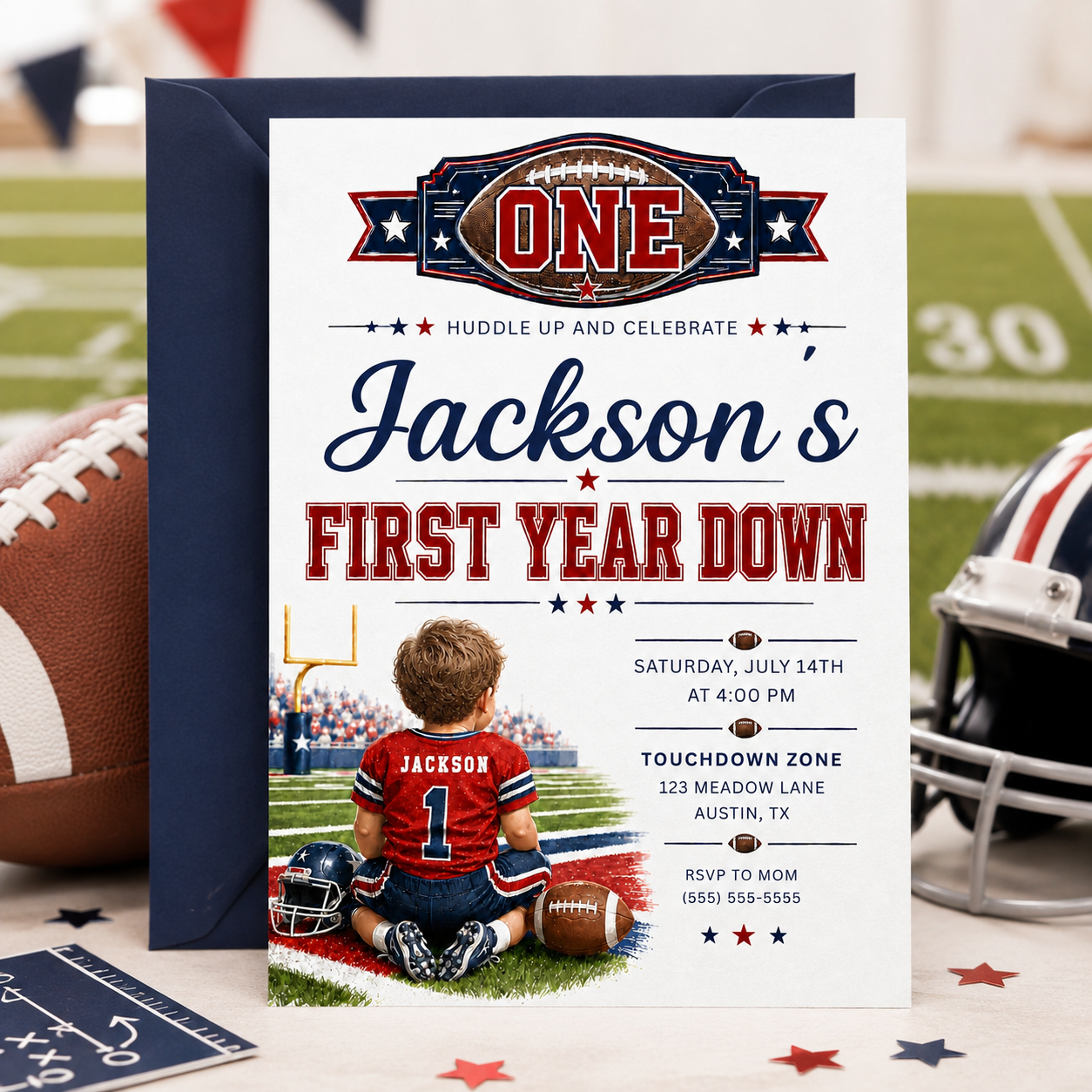 First Year Down first birthday invitation with little football player, stadium field, helmet, football, and red navy sports birthday party details