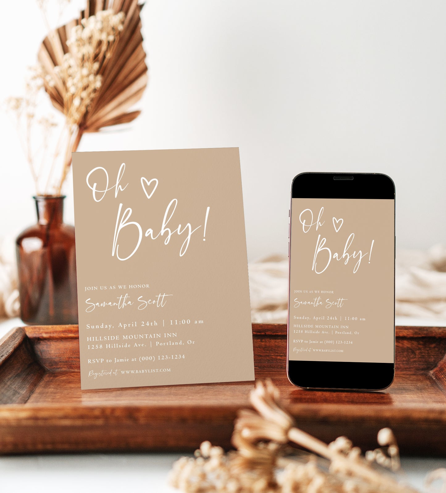 Editable neutral oh baby baby shower invitation Canva template with oversized script typography and hand-drawn heart on a warm sand beige background