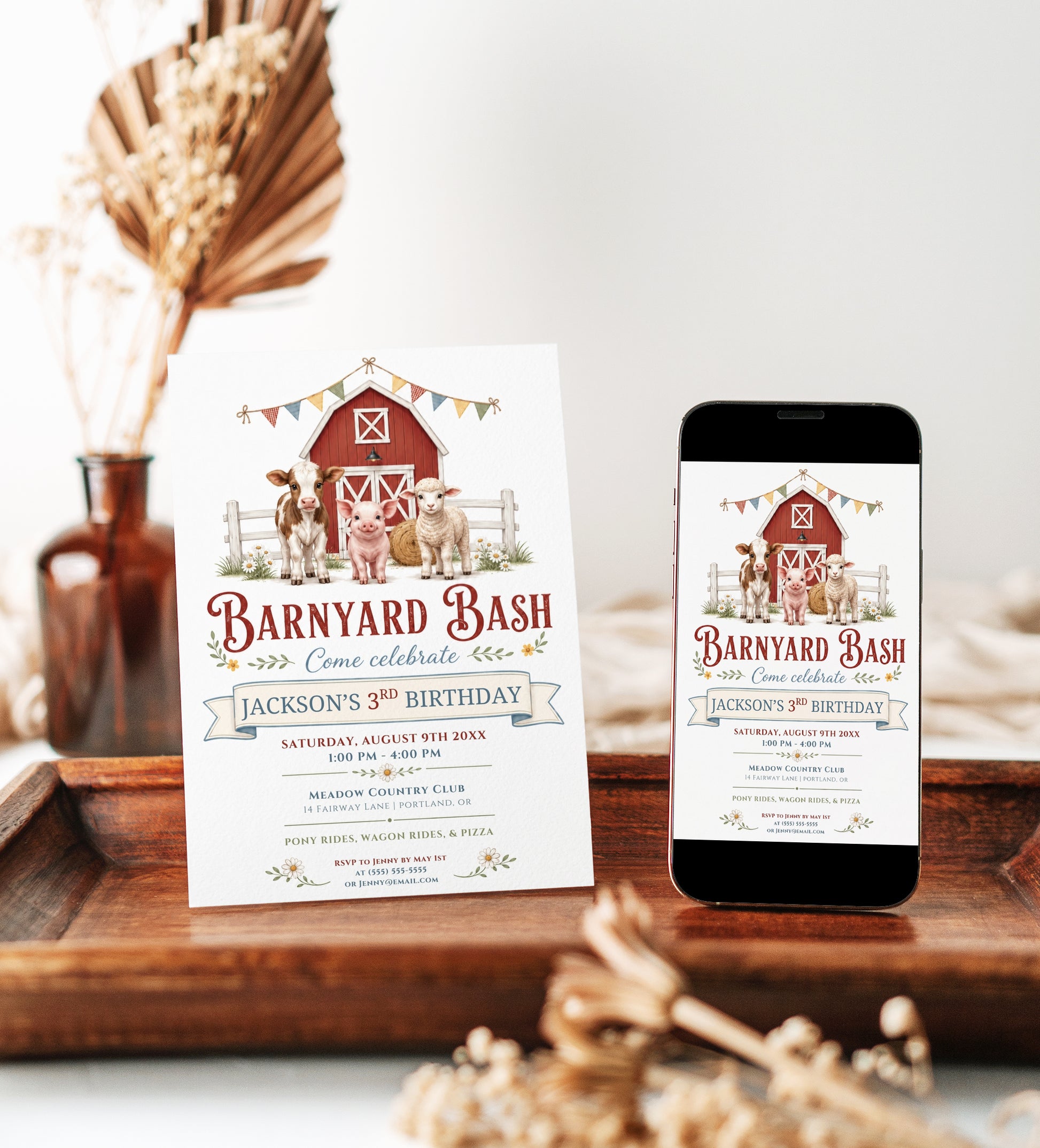 Barnyard bash farm birthday invitation with a red barn, calf, pig, and lamb in red, blue, and green