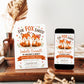 Fox baby shower invitation with two cute baby foxes, leafy greenery, hearts, orange banner, playful woodland details, and warm orange brown accents