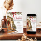Christmas housewarming party invitation with a wooden front door, evergreen wreath and garlands, red bows, glowing lanterns, snowy steps, and a Home Sweet Home doormat