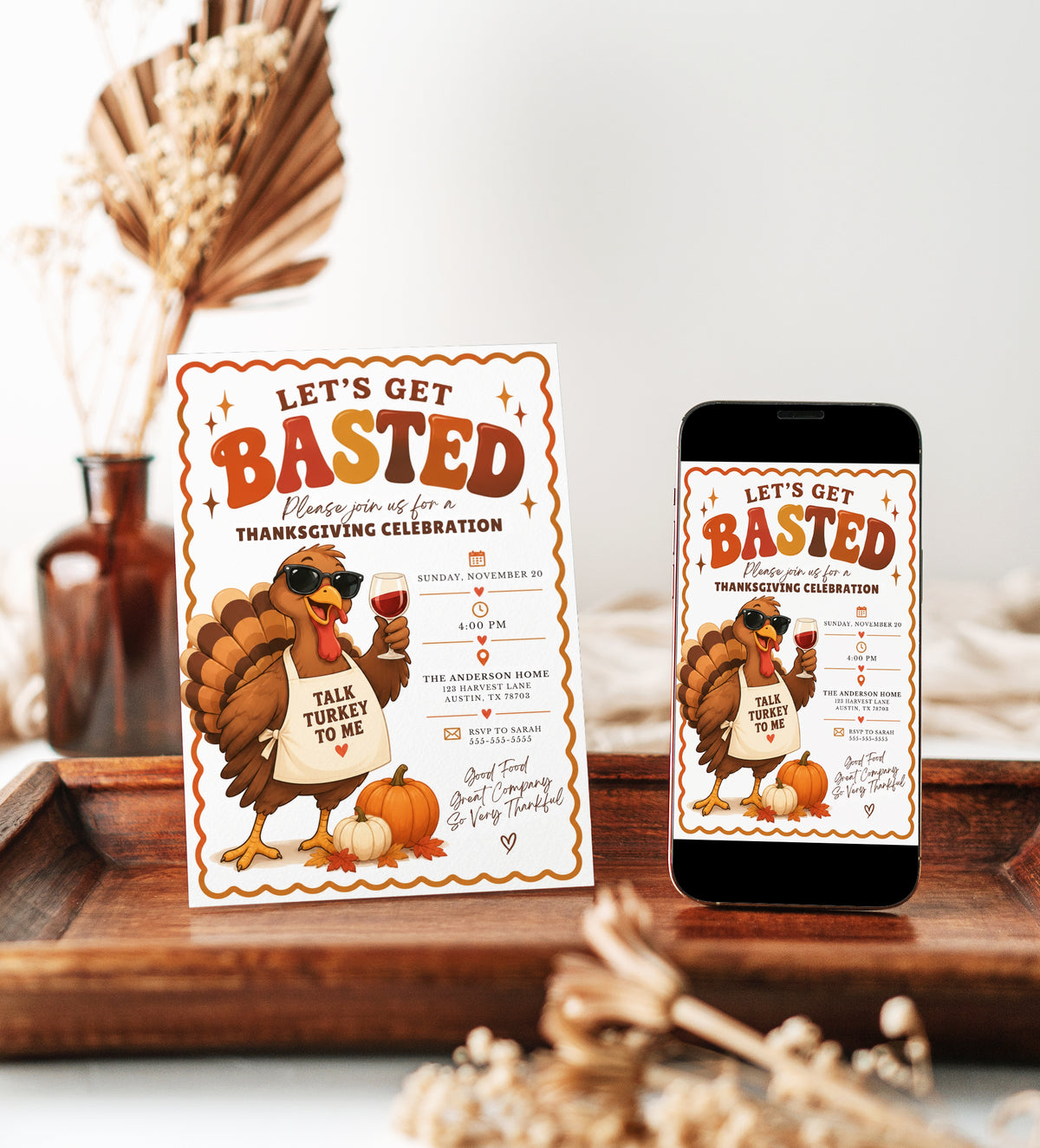 Thanksgiving dinner invitation with Let’s Get Basted headline, cartoon turkey wearing sunglasses and holding a wine glass, and fall pumpkins