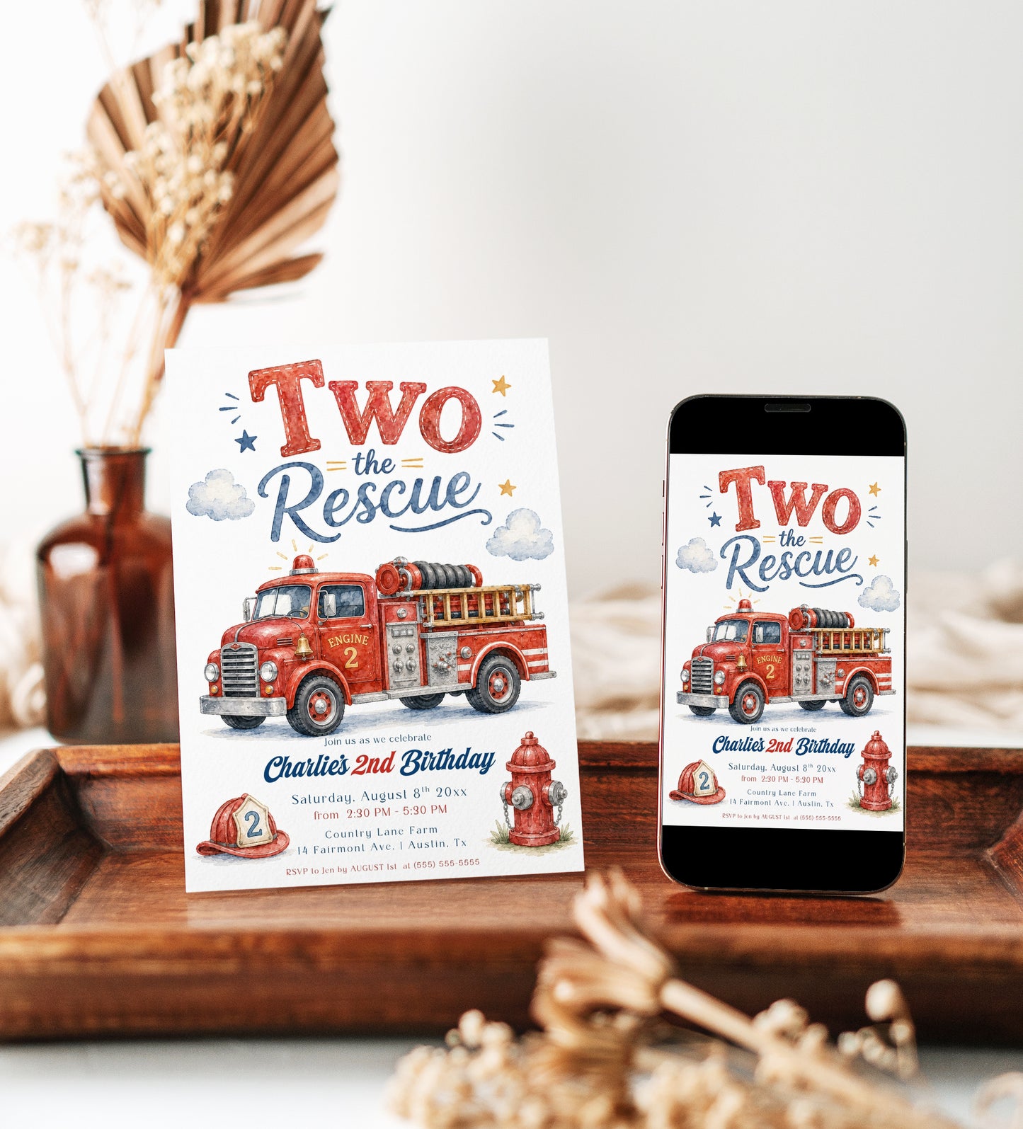 Two the Rescue second birthday invitation featuring a red fire truck, firefighter helmet, fire hydrant, clouds and stars in red, blue and gold.