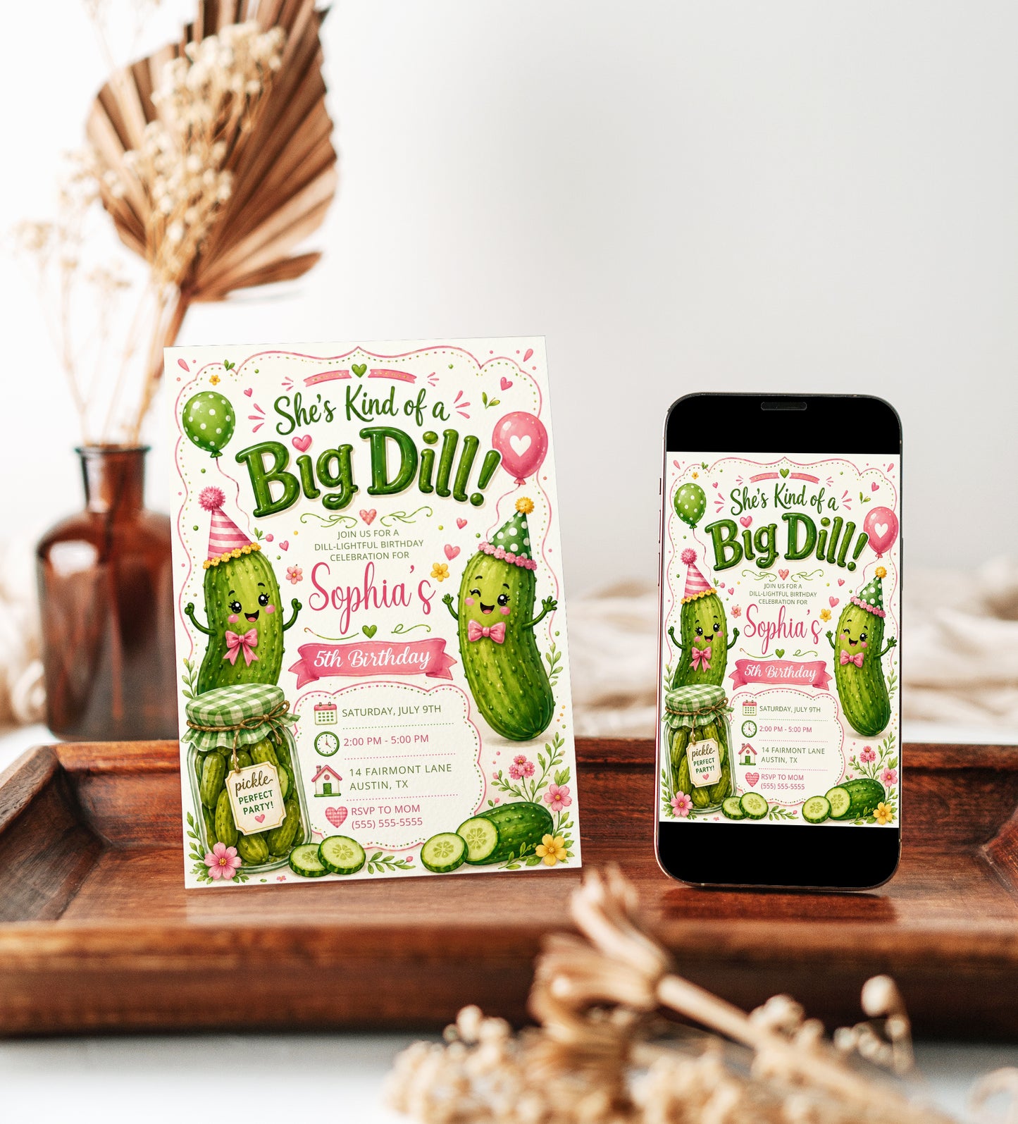 Big dill birthday invitation with cute pickle characters, party hats, balloons, pink bows, pickle jar, flowers, greenery, and green pink party details