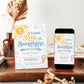 A little ray of sunshine baby shower invitation with golden sun, soft blue clouds, stars, hearts, and a blue and yellow hot air balloon