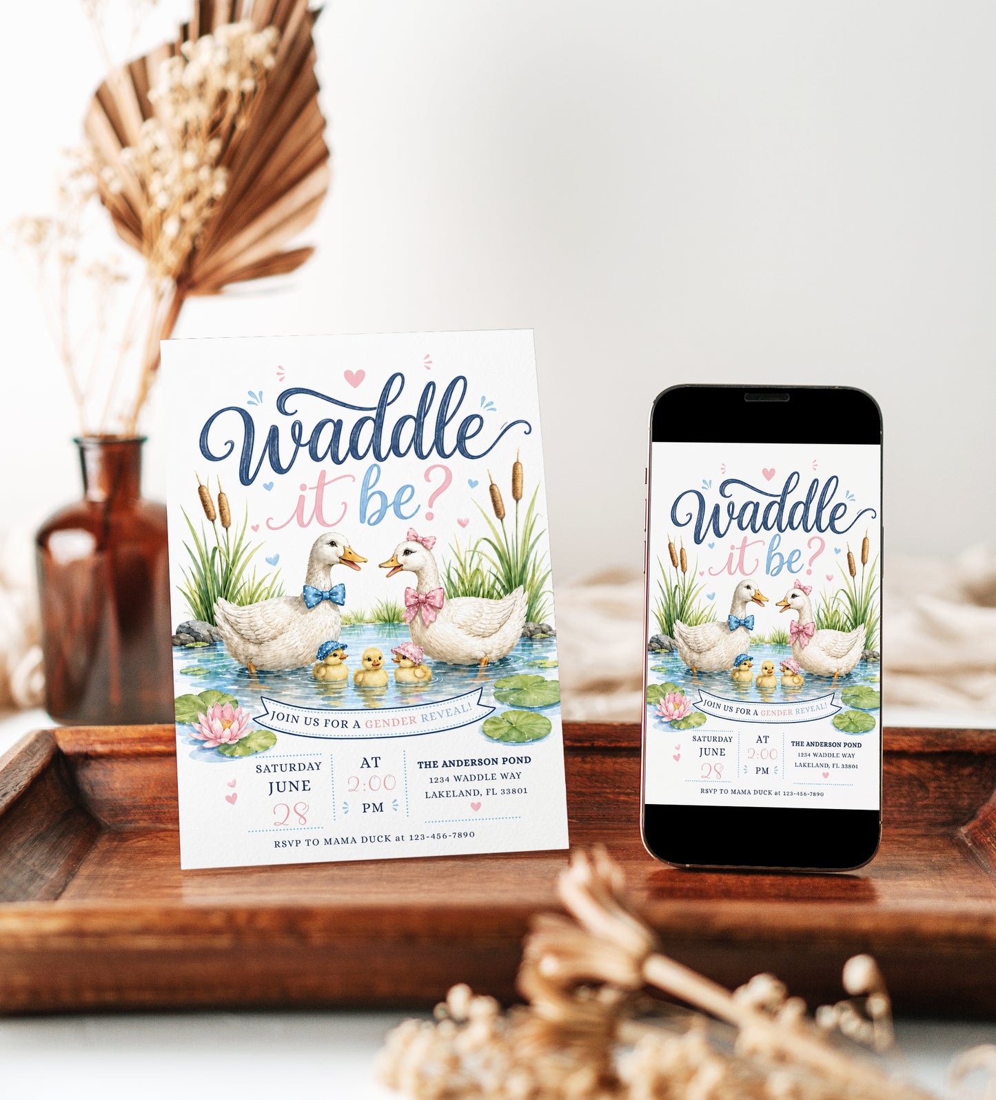 Waddle it be gender reveal invitation with watercolor ducks, baby ducklings, pink and blue bows, pond water, cattails, lily pads, hearts, and pastel details