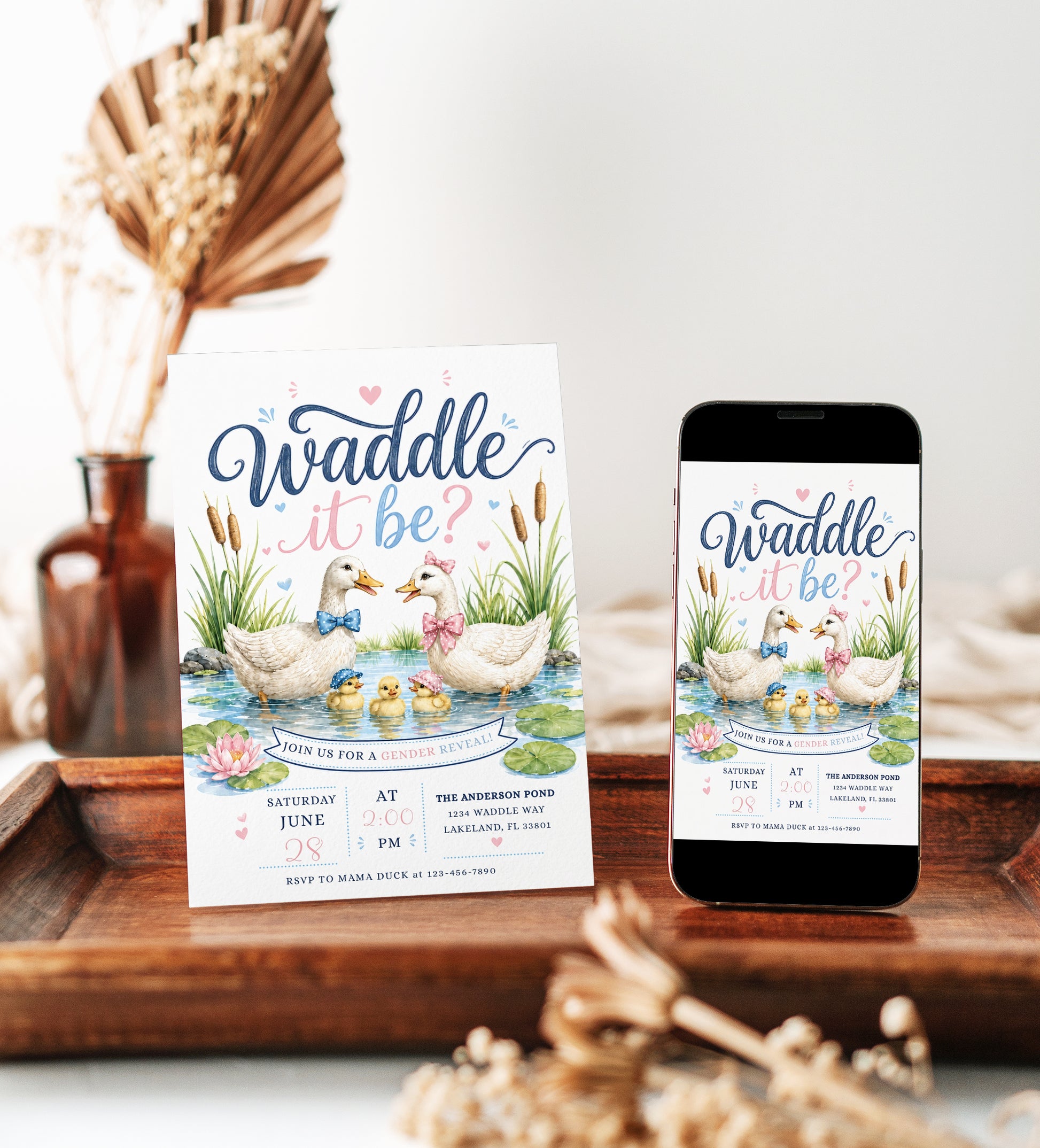 Waddle it be gender reveal invitation with watercolor ducks, baby ducklings, pink and blue bows, pond water, cattails, lily pads, hearts, and pastel details