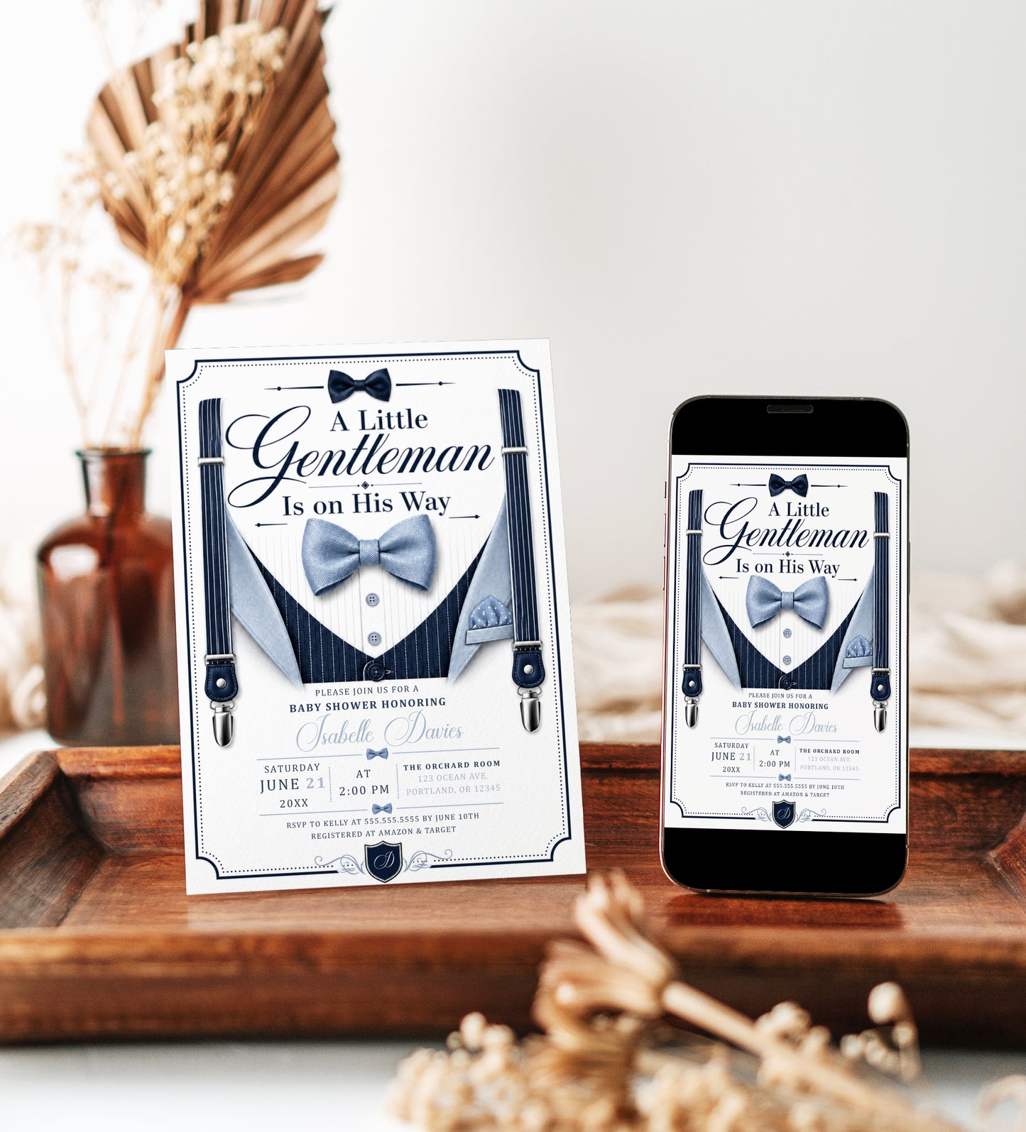Little gentleman baby shower invitation with navy suspenders, blue bow tie, pinstripe vest, pocket square, buttons, and elegant baby boy shower details