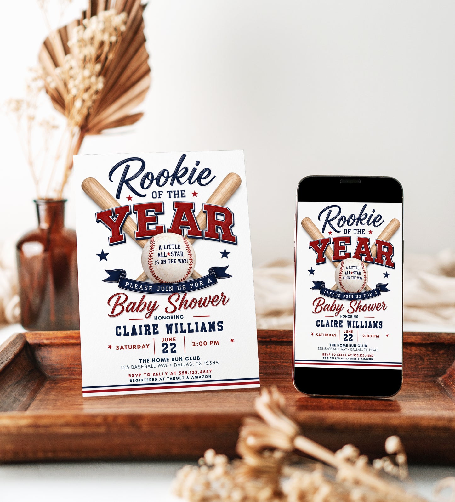 Rookie baseball baby shower invitation with crossed baseball bats, baseball, varsity lettering, navy ribbon banner, red and blue stars, and classic sports shower details