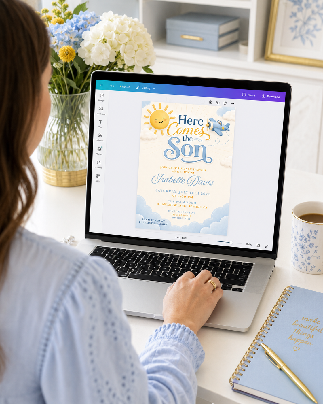 Editable here comes the son baby shower invitation Canva template with smiling sun, blue toy airplane, fluffy clouds, and bold navy and sky blue typography on a soft cream background, shown as a flat lay mockup