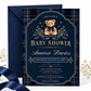 Teddy bear baby shower invitation with a brown bear wearing a navy bow, blue plaid border, gold lettering, stars, and greenery on a dark navy background