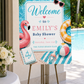 Pool party baby shower welcome sign with a flamingo float, beach ball, and heart sunglasses in pink and aqua