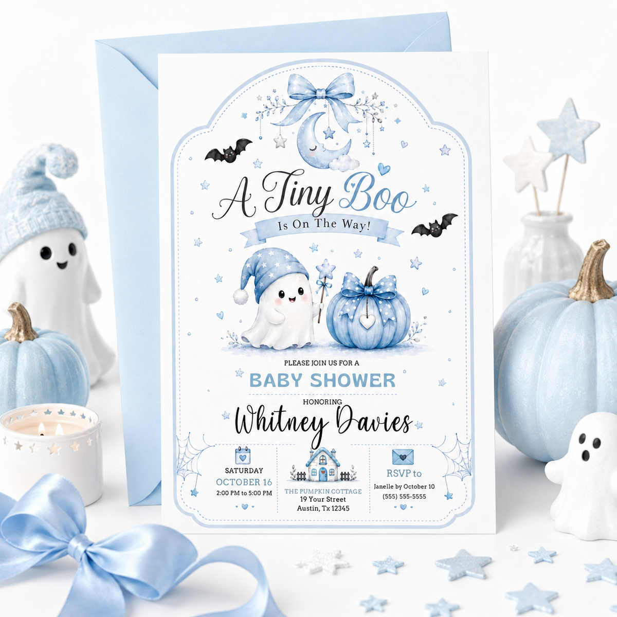Tiny boo baby shower invitation with cute ghost, blue pumpkin, bats, crescent moon, stars, spiderweb accents, bow details, and soft Halloween baby boy design