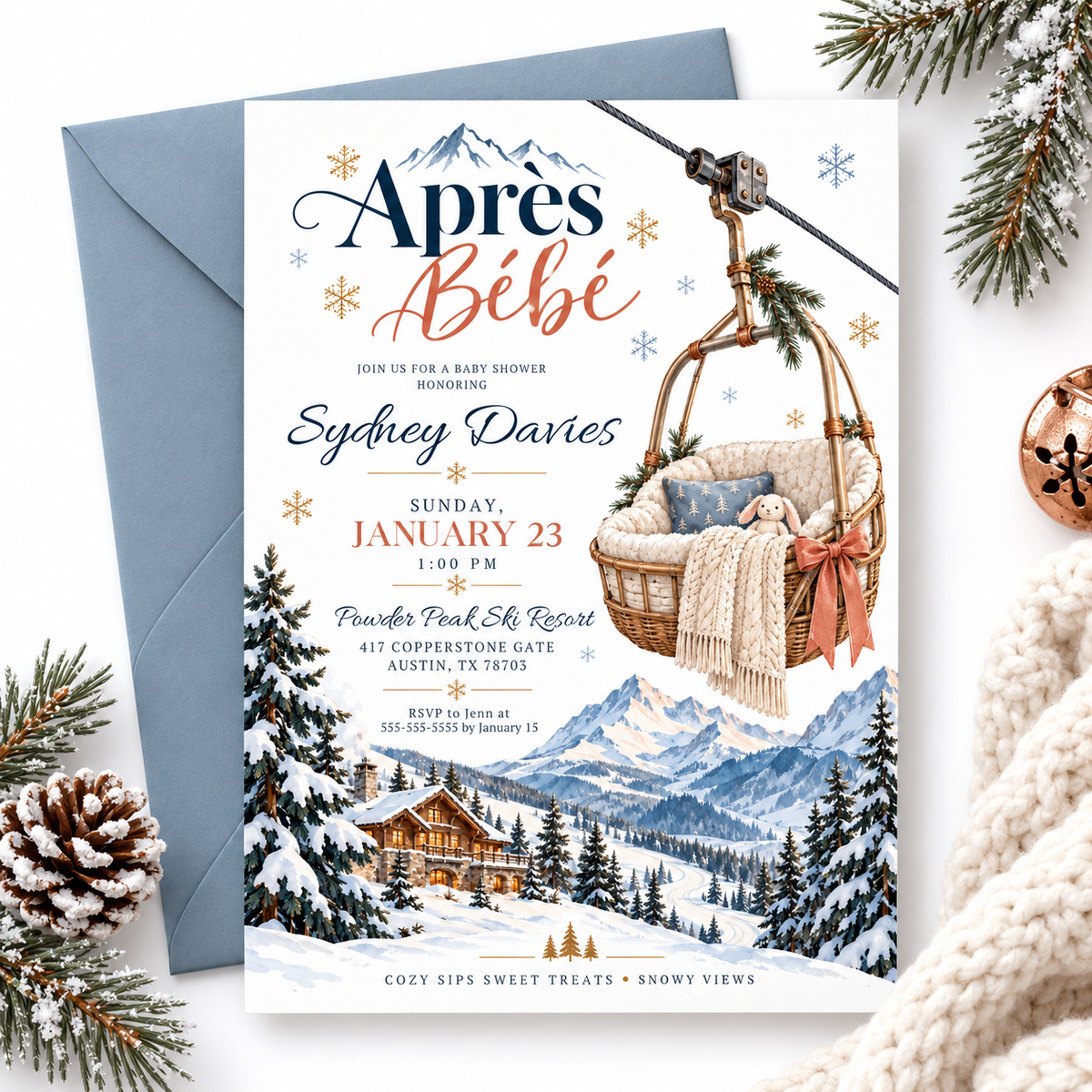 Après Bébé baby shower invitation with a basket-style ski lift holding a plush bunny and knit blanket above snowy mountains, evergreen trees, and a ski chalet