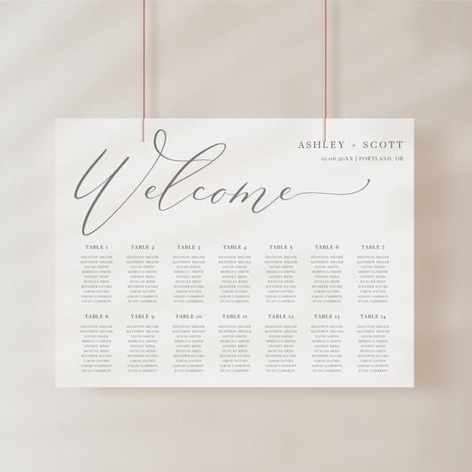 Minimalist gray horizontal wedding seating chart template with oversized calligraphy welcome script and 14 table layout, editable in Canva
