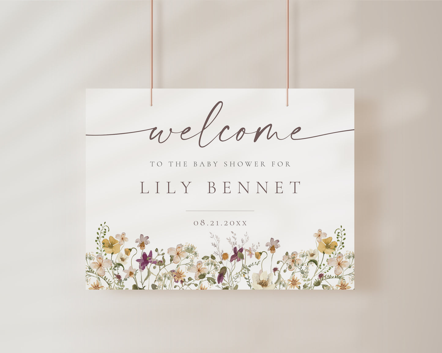 Horizontal wildflower baby shower welcome sign template with watercolor meadow flowers in yellow, purple, and cream, editable in Canva