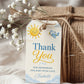 Editable here comes the son baby shower favor hang tag Canva template with smiling sun, blue toy airplane, fluffy clouds, and bold navy and golden script typography on a warm cream background