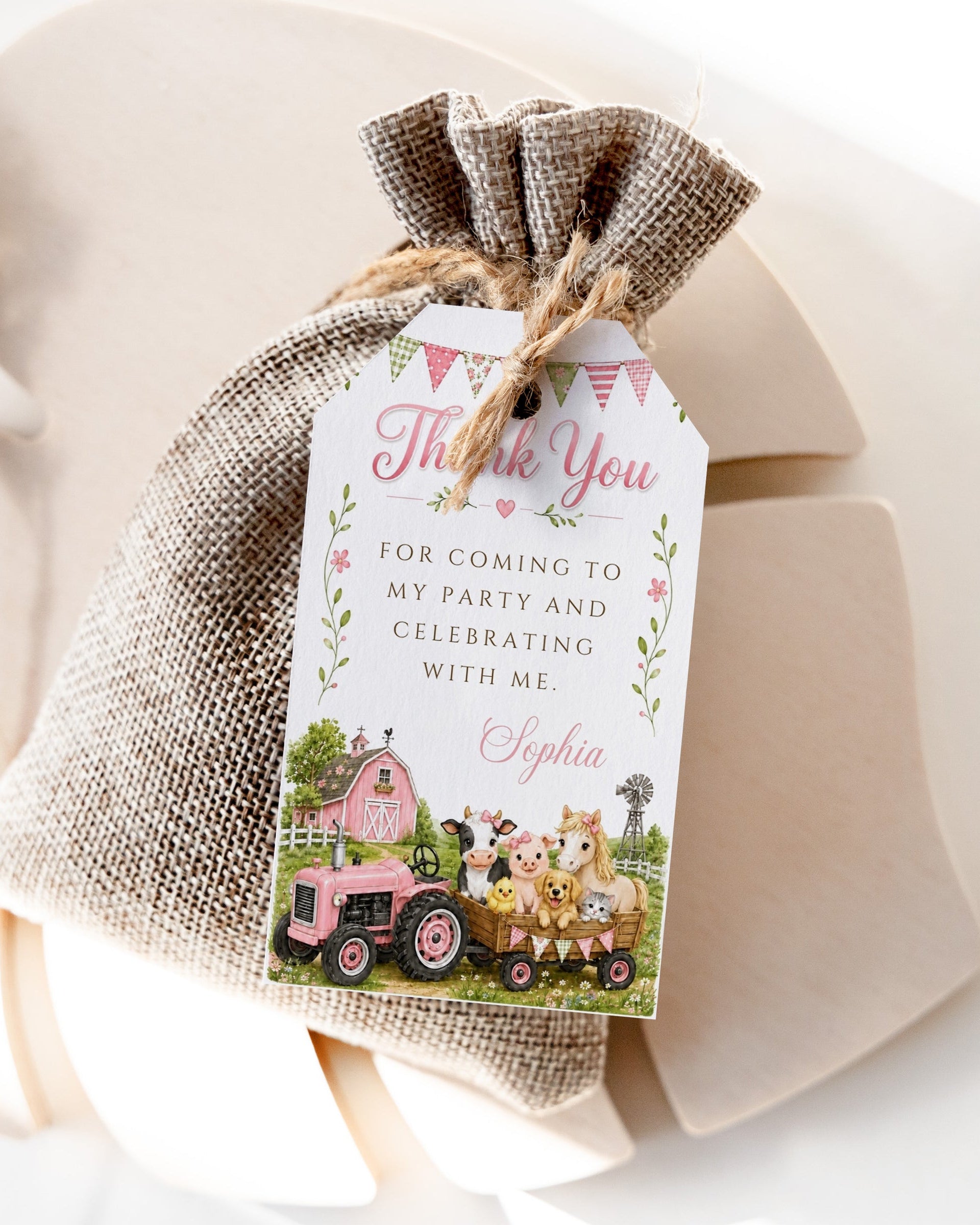 Barnyard birthday thank-you favor tag featuring a pink tractor, pink barn, cow, pig, pony, chick, puppy, kitten and pastel bunting.
