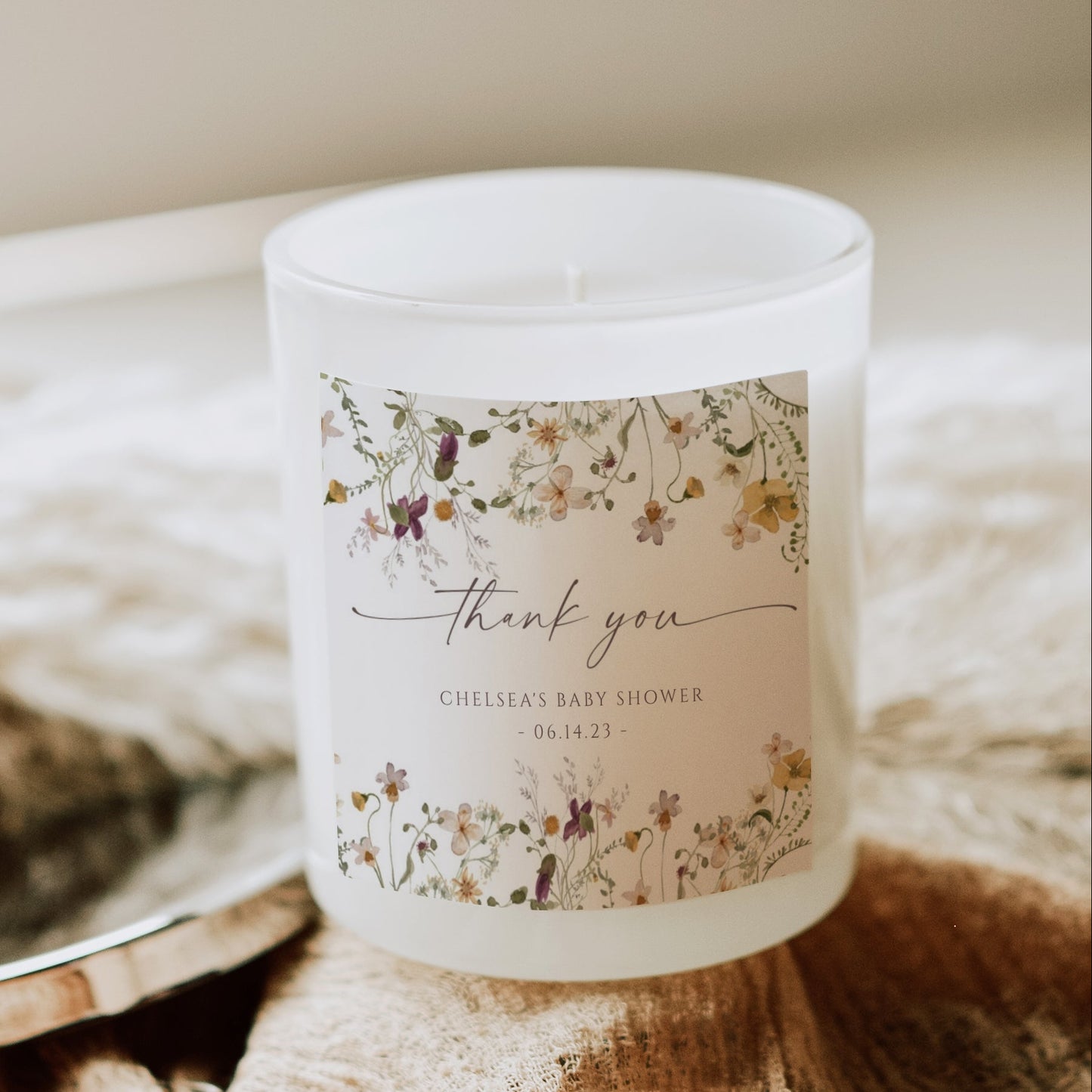 Wildflower baby shower thank you gift tag template with watercolor meadow flowers in yellow, purple, and cream, editable in Canva