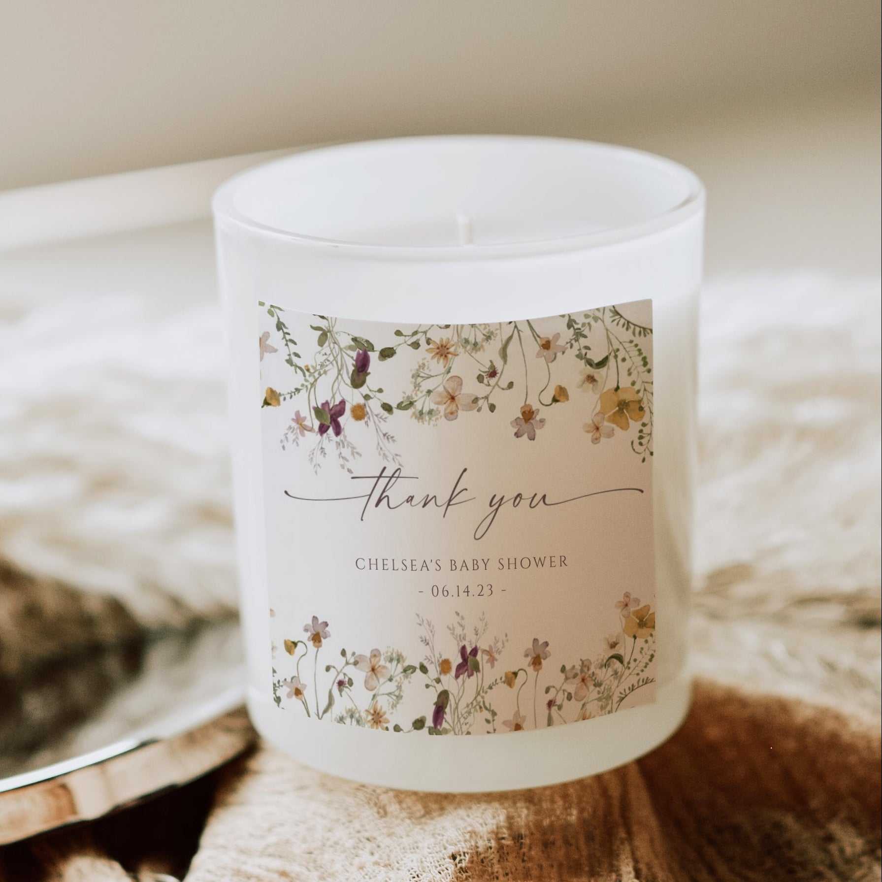 Wildflower baby shower thank you gift tag template with watercolor meadow flowers in yellow, purple, and cream, editable in Canva