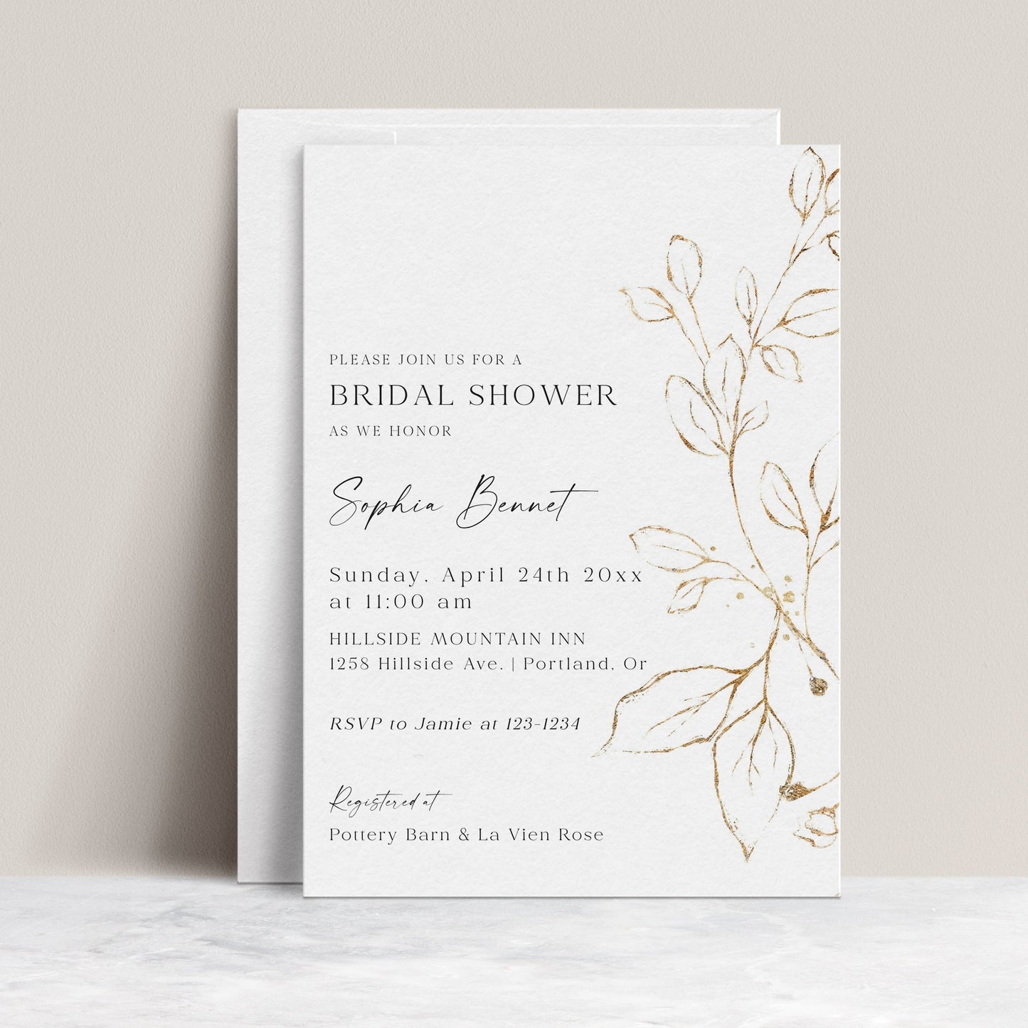 Elegant gold leaf bridal shower invitation template with hand-painted gold botanical branch on white background, editable in Canva