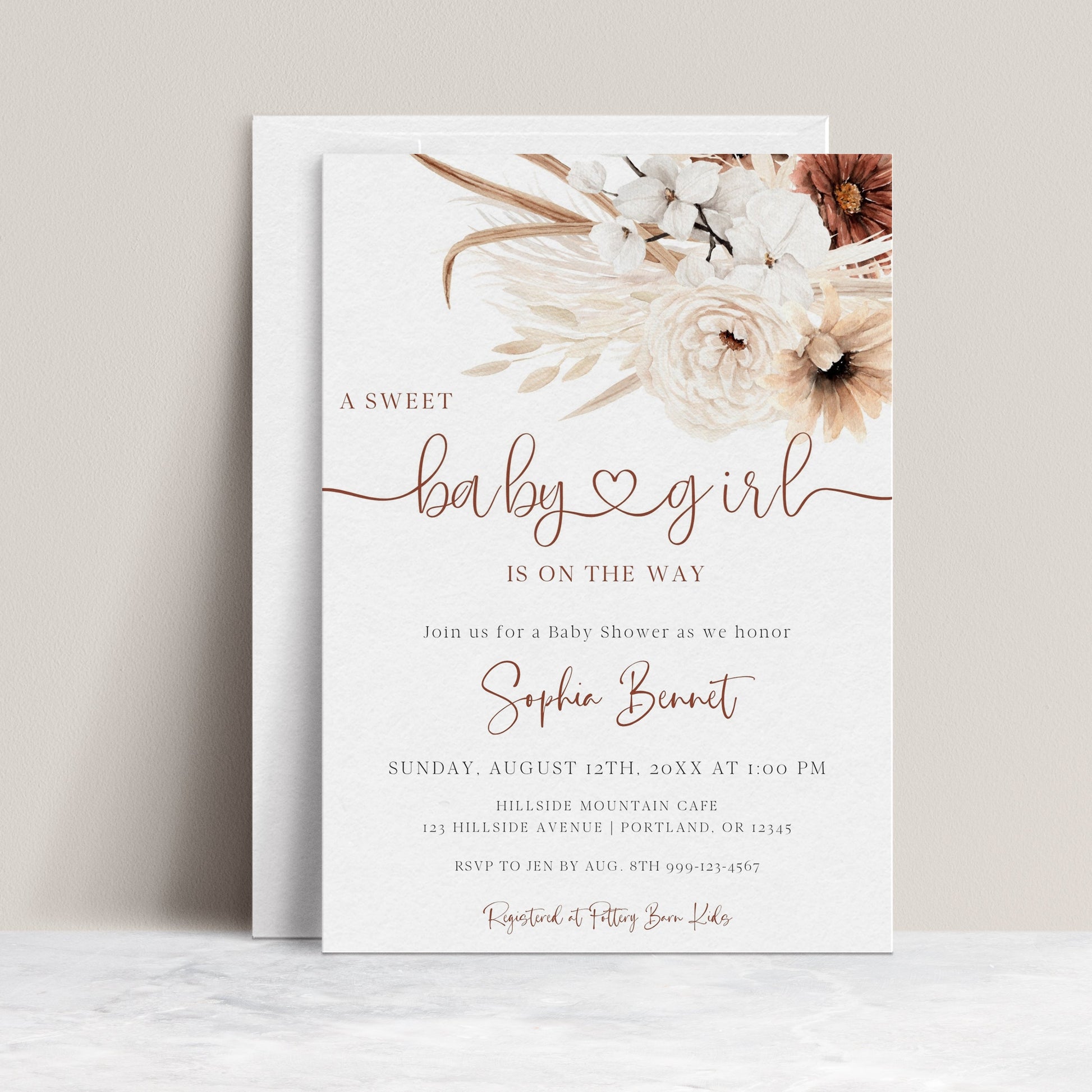 Boho brown floral baby girl shower invitation template with pampas grass, white orchids, and terracotta florals with rust calligraphy script, editable in Canva