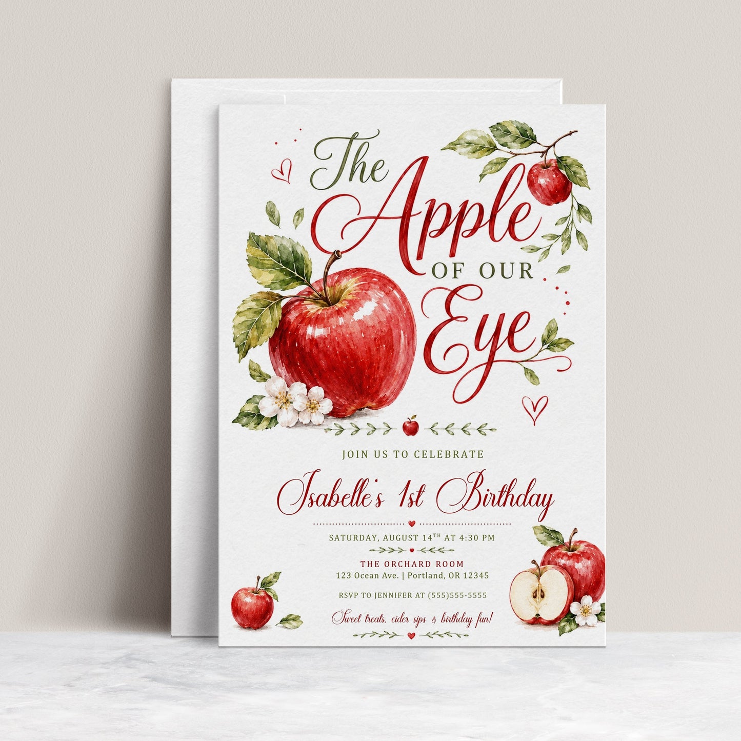 Apple of our eye birthday invitation with watercolor red apples, leafy branches, apple blossoms, hearts, elegant script lettering, and orchard birthday details