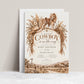 Cowboy baby shower invitation with a saddled horse, cowboy hat, lasso, dried florals, and rustic ranch scene in brown and cream for a western baby boy shower