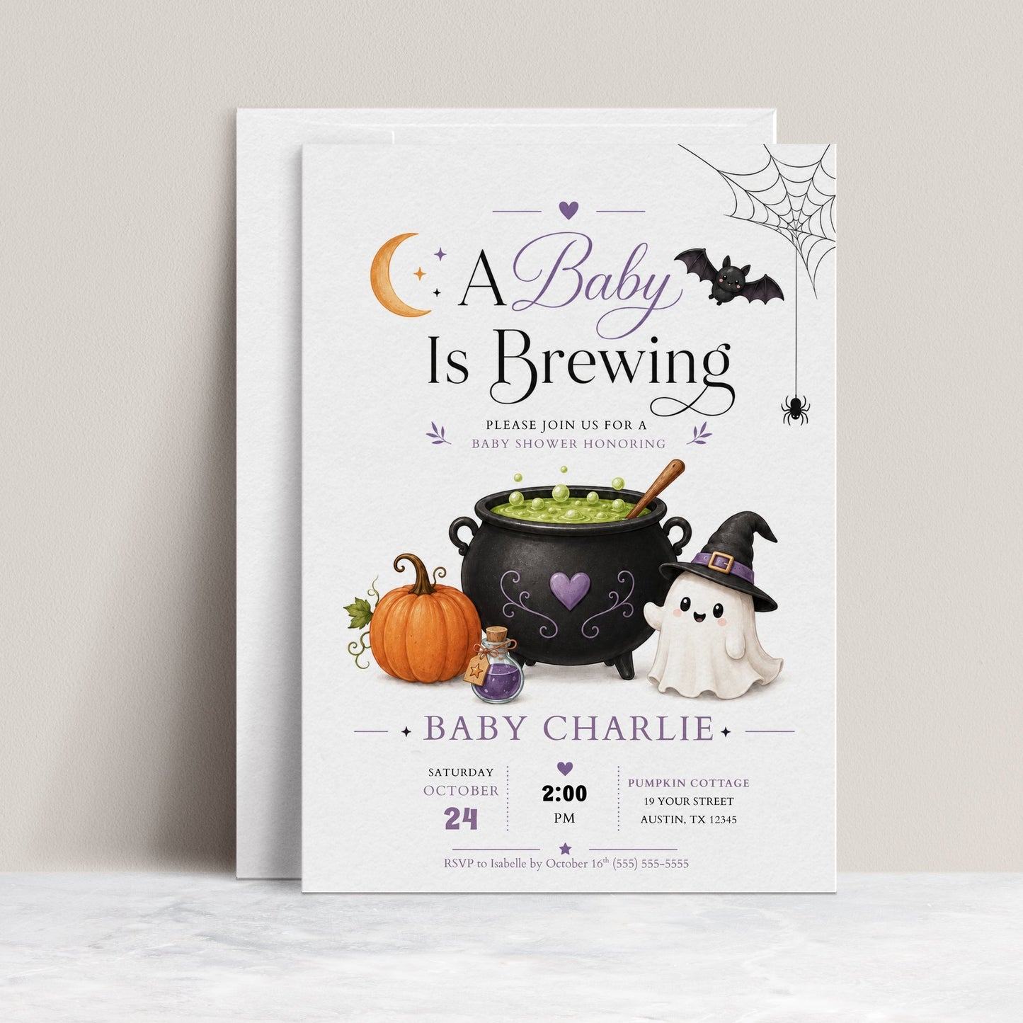 A Baby Is Brewing baby shower invitation with bubbling cauldron, pumpkin, potion bottle, ghost in witch hat, bat, crescent moon, and Halloween baby shower details