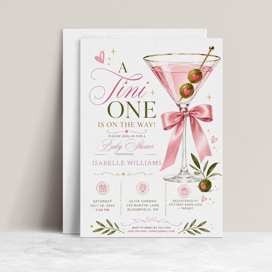 Editable pink martini baby shower invitation Canva template with gold-rimmed martini glass, satin pink bow, heart-topped olives, gold sparkle accents, and olive branch sprigs on a white background