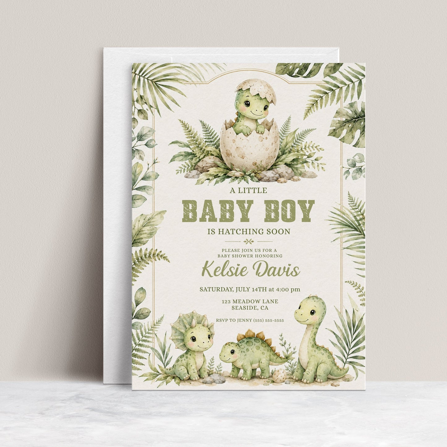 Baby boy dinosaur baby shower invitation with watercolor baby dinosaurs, hatching egg, tropical leaves, ferns, greenery, rocks, and soft sage green details