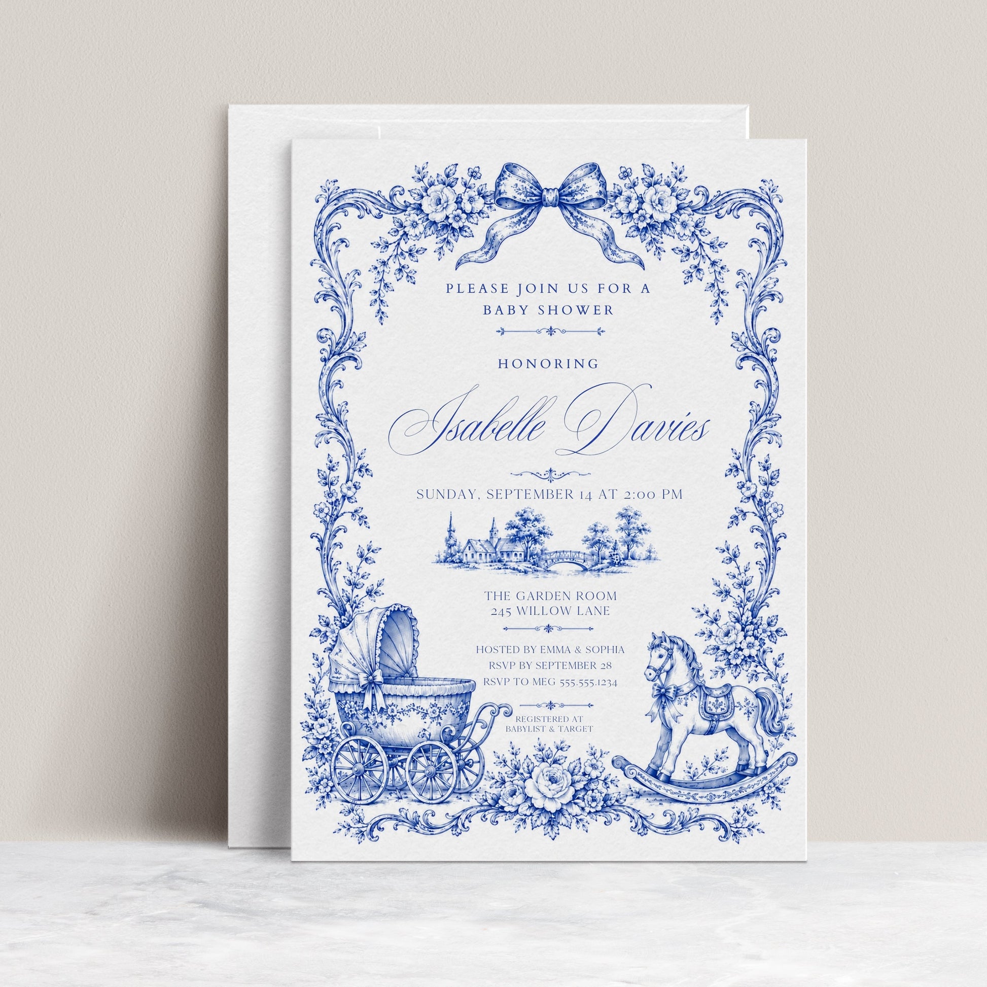 Blue toile baby shower invitation with royal blue floral border, bow, baby carriage, rocking horse, countryside scene, and elegant vintage details