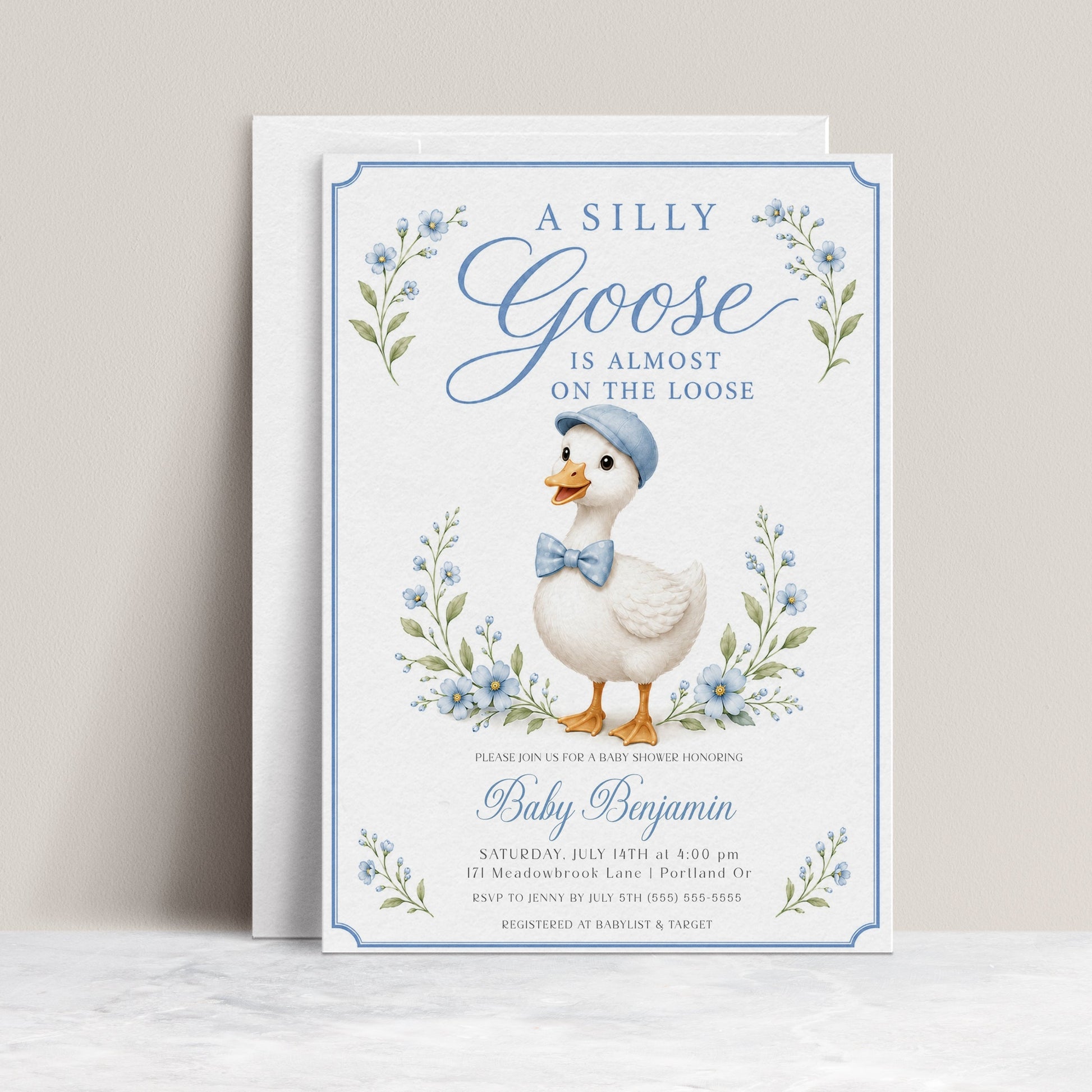 Editable silly goose boy baby shower invitation Canva template with illustrated gosling in blue newsboy cap and gingham bow tie, blue wildflowers, botanical sprigs, and blue border on a white background