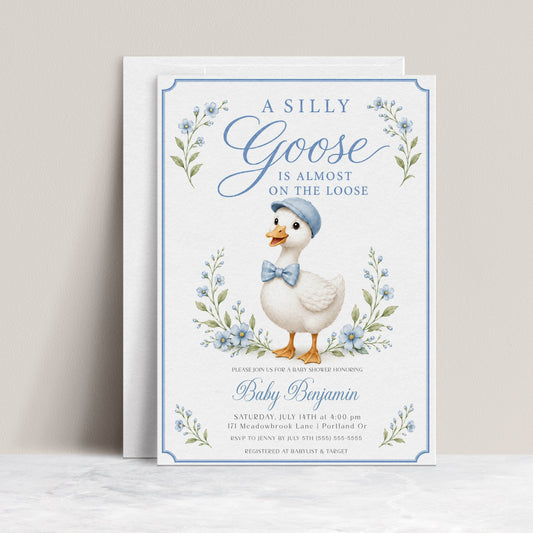 Editable silly goose boy baby shower invitation Canva template with illustrated gosling in blue newsboy cap and gingham bow tie, blue wildflowers, botanical sprigs, and blue border on a white background