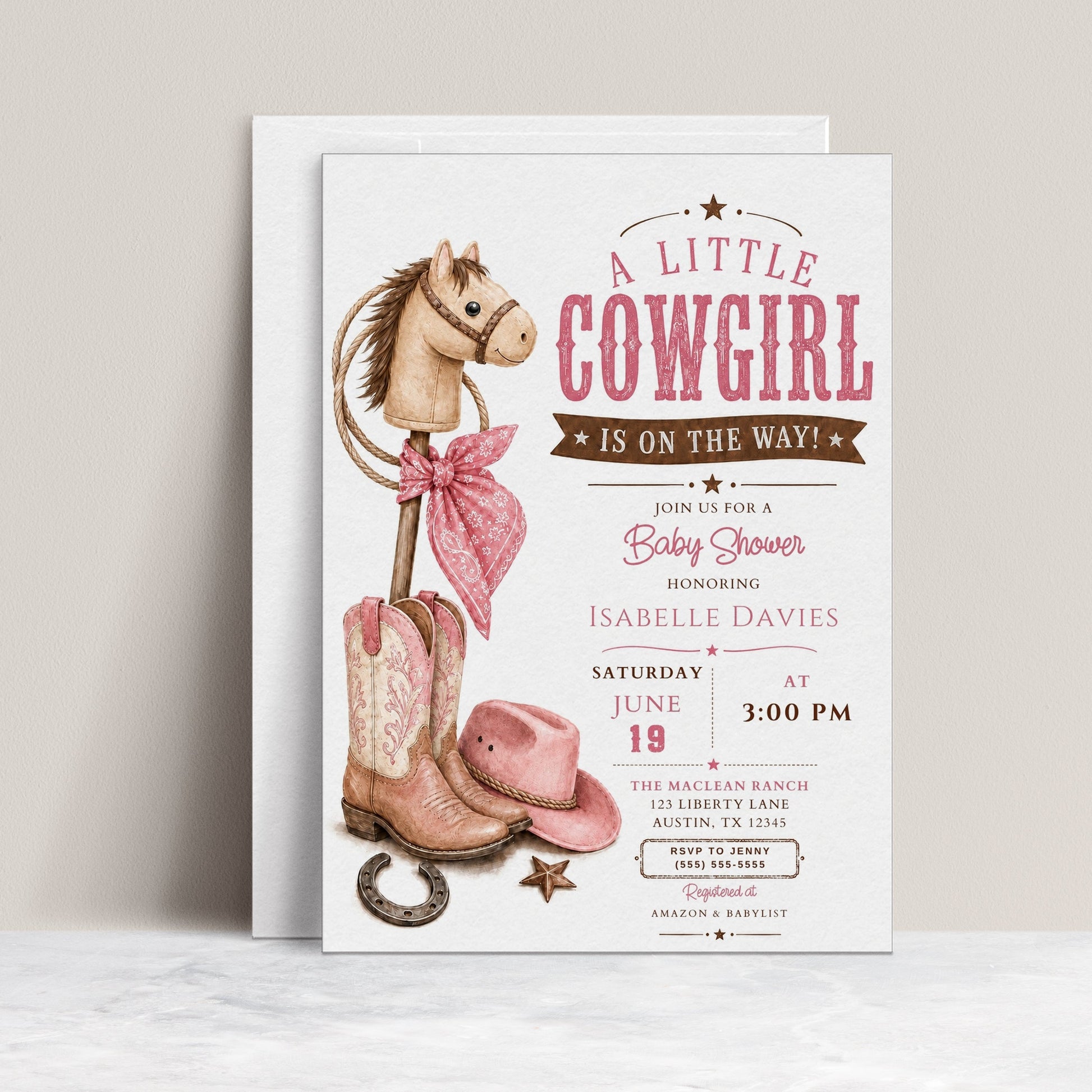 Little cowgirl baby shower invitation with a stick horse, pink cowgirl boots, hat, and bandana in pink and brown