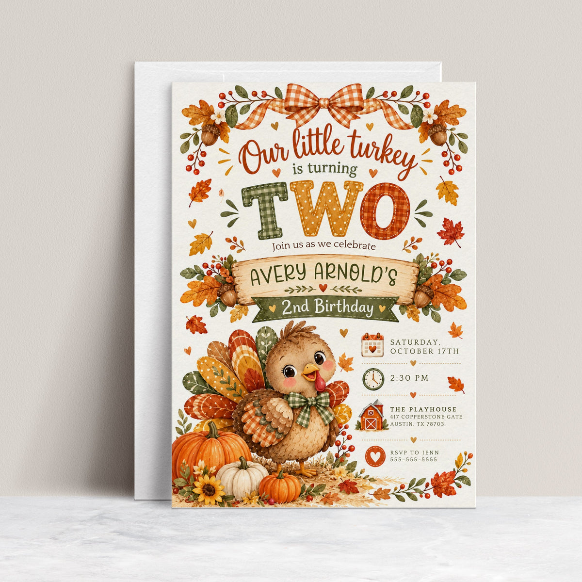 Fall 2nd birthday invitation with Our Little Turkey Is Turning Two wording, a cute turkey, orange gingham bow, pumpkins, and autumn leaves