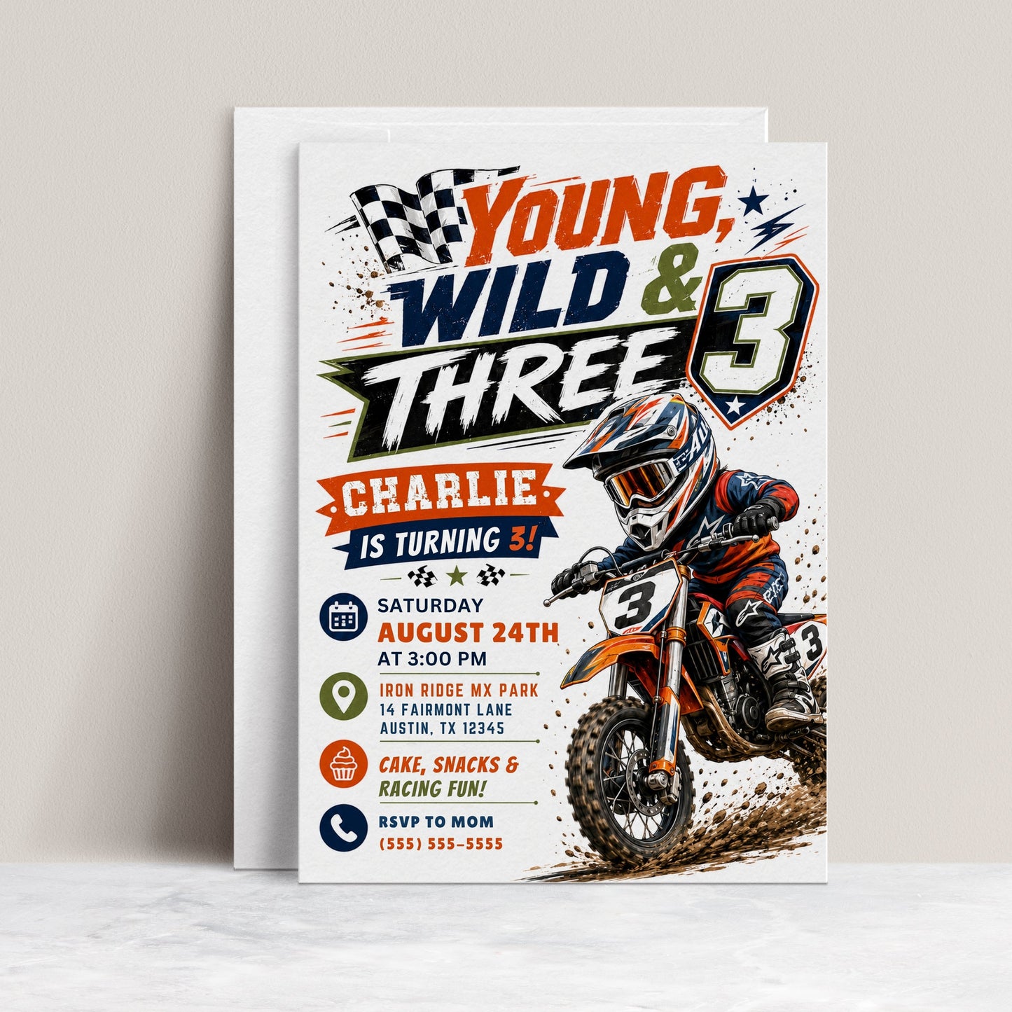 Young wild and three motocross invitation with dirt bike rider, checkered flags, racing helmet, muddy tire splashes, stars, lightning accents, and bold boys 3rd birthday details