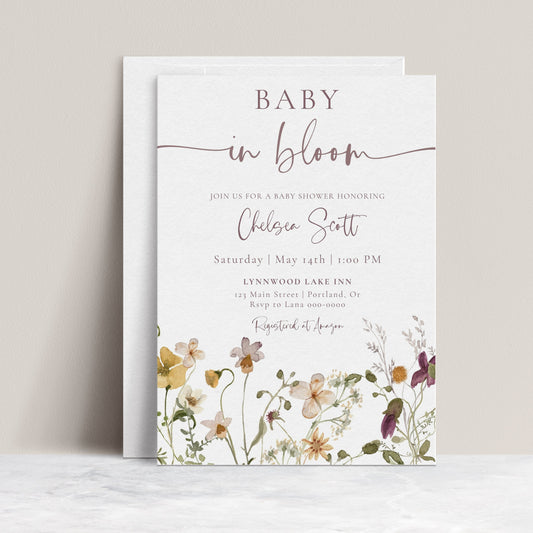 Baby in bloom wildflower baby shower invitation template with watercolor meadow flowers in yellow, purple, and cream, editable in Canva