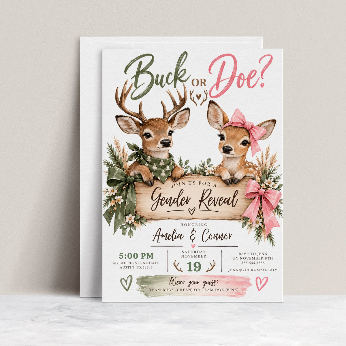 Buck or Doe gender reveal invitation with an antlered deer in a green bandana, a doe wearing a pink bow, rustic wooden sign, greenery, and pink and green ribbons