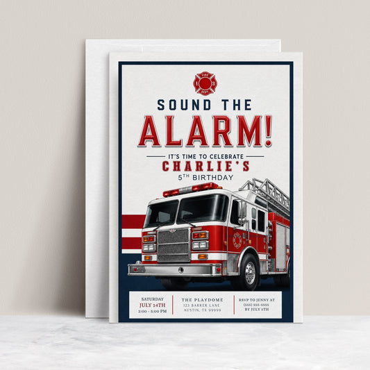 Sound the Alarm firetruck birthday invitation featuring a realistic red ladder fire engine with bold red, white and navy details.