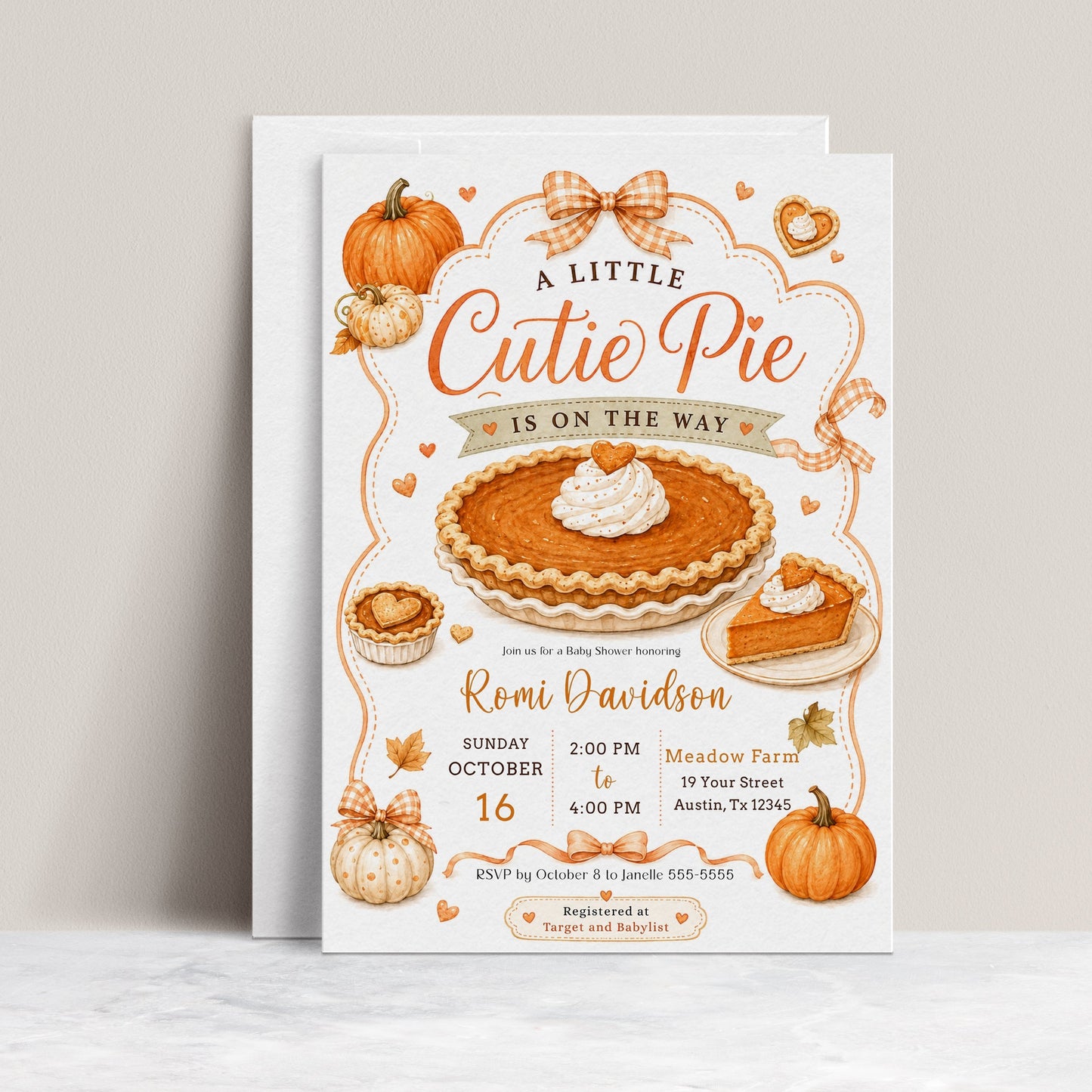 Cutie pie baby shower invitation with pumpkin pie, pumpkins, gingham bows, autumn leaves, mini pies, and cozy fall baby shower details