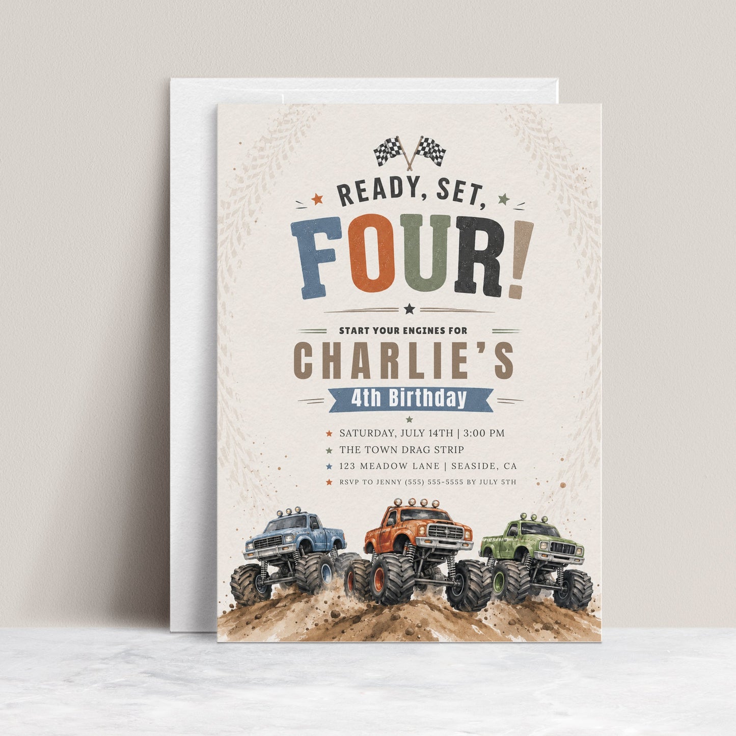 Ready set four monster truck birthday invitation with blue, orange, and green monster trucks on a dirt track with checkered flags in blue, orange, and green