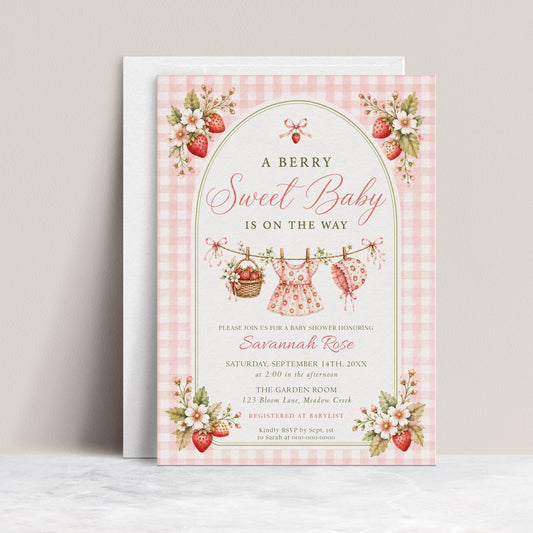 Editable strawberry baby shower invitation Canva template with watercolour strawberries, white blossoms, clothesline scene, and pink gingham background, shown with front and back of card