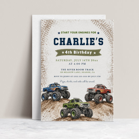 Monster truck birthday invitation featuring blue, red and green trucks racing over muddy hills with tire-track details.
