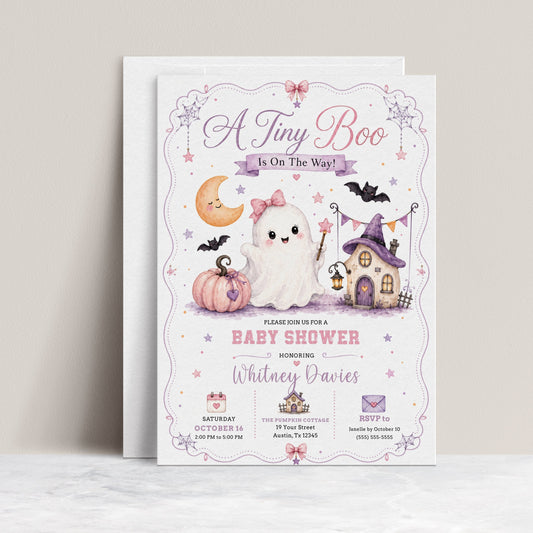 Halloween girl baby shower invitation with cute ghost, pink pumpkin, bats, crescent moon, haunted house, spiderwebs, stars, and pastel Halloween baby shower details