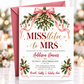 Christmas bridal shower invitation with pink satin bows, mistletoe, evergreen branches, gold bells and MISStletoe to Mrs lettering