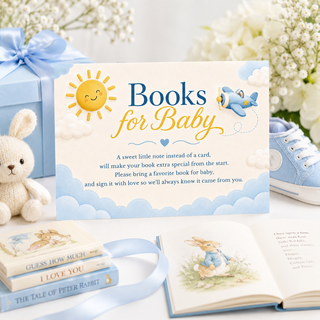 Editable here comes the son books for baby card Canva template with smiling sun, blue toy airplane, fluffy clouds, and navy and golden script typography on a warm cream background, landscape orientation
