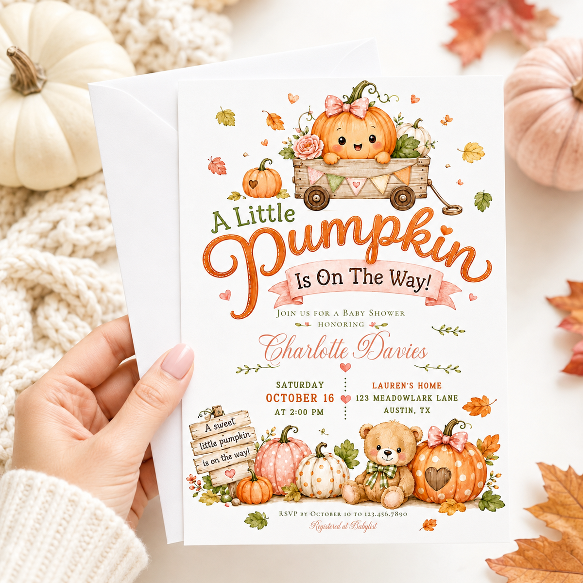 Little pumpkin baby shower invitation with pumpkins, teddy bear, wooden wagon, autumn leaves, pink bows, rustic sign, florals, and soft fall details