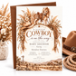 Cowboy baby shower invitation with a saddled horse, cowboy hat, lasso, dried florals, and rustic ranch scene in brown and cream for a western baby boy shower